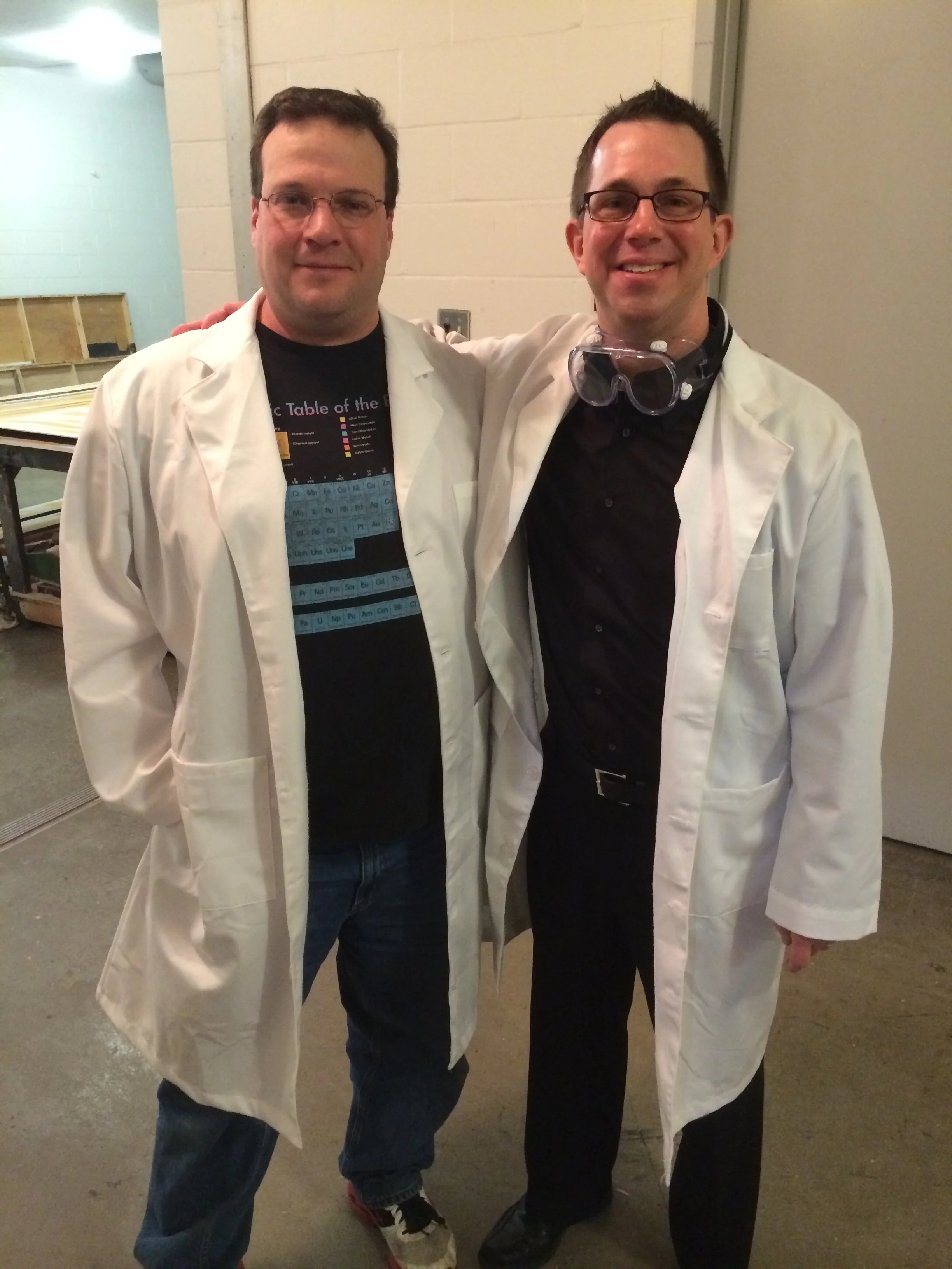 Dr. Patrick Herak and Douglas Droste in lab coats